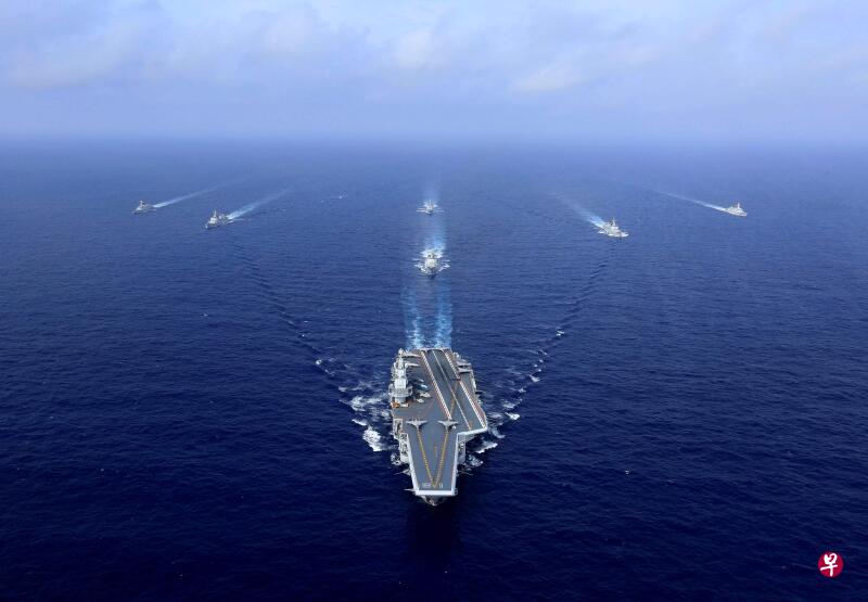 按计划内例行安排，中国辽宁号等舰艇通过冲绳进入太平洋
